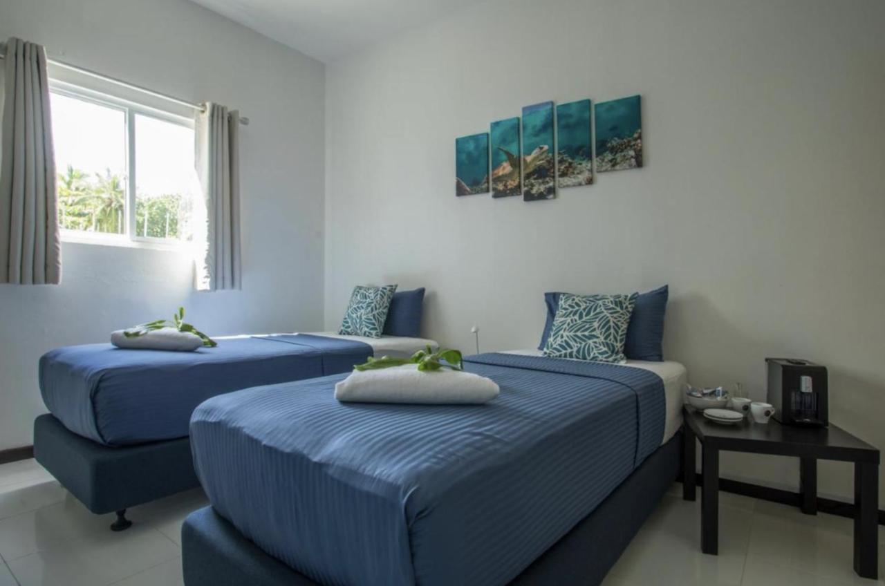 Varunula Surf Camp Thulusdhoo Exterior foto